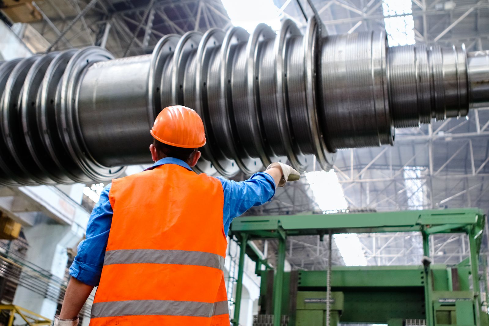 Engineer inspecting industrial equipment